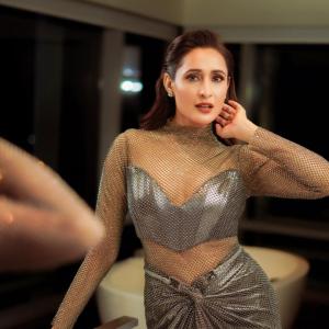 Pragya Jaiswal Stunning Look in Metallic Mesh Dress - Glamorous Fashion Statement