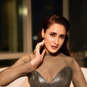 Pragya Jaiswal Stunning Look in Metallic Mesh Dress - Glamorous Fashion Statement