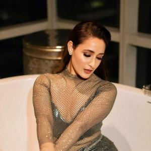 Pragya Jaiswal Stunning Look in Metallic Mesh Dress - Glamorous Fashion Statement