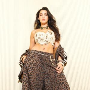Nora Fatehi Bold Glamour Look in Leopard Print Pants and Embellished Crop Top
