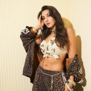 Nora Fatehi Bold Glamour Look in Leopard Print Pants and Embellished Crop Top