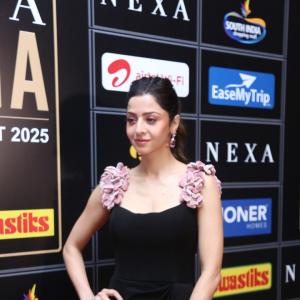 Elegant Woman in Black Dress at Glamorous Event | Red Carpet Fashion