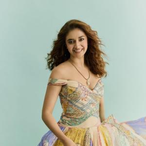 Keerthi Suresh in Vibrant Flowing Dress Spinning Joyfully with Grace