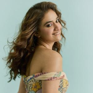 Keerthi Suresh in Vibrant Flowing Dress Spinning Joyfully with Grace