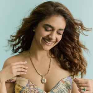 Keerthi Suresh in Vibrant Flowing Dress Spinning Joyfully with Grace