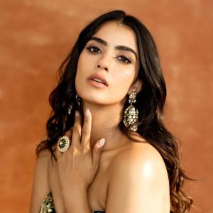 Kavya Thappar Stuns in Green and Gold Embellished Outfit