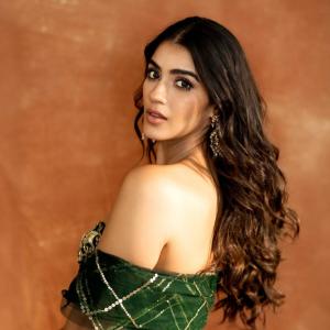 Kavya Thappar Stuns in Green and Gold Embellished Outfit