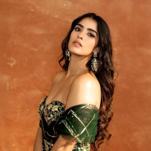 Kavya Thappar Stuns in Green and Gold Embellished Outfit