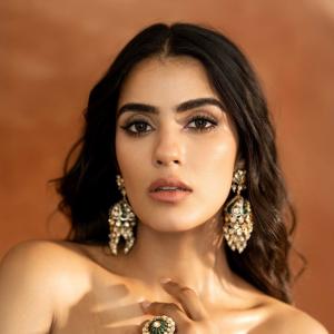 Kavya Thappar Stuns in Green and Gold Embellished Outfit