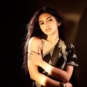 Actress Sreeleela Stunning Look in Black Saree with Golden Design