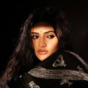 Actress Sreeleela Stunning Look in Black Saree with Golden Design