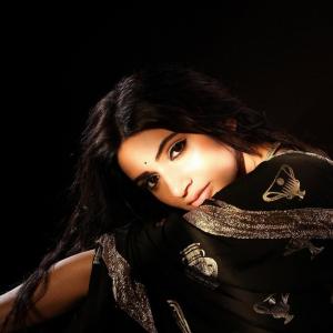 Actress Sreeleela Stunning Look in Black Saree with Golden Design