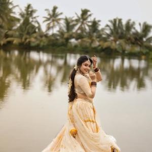 Mokksha in Traditional Lehenga – Elegant Photoshoot by the Water and Garden