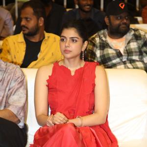 Kalyani Priyadarshan Stuns in Red Saree at Event – Elegant and Graceful Look