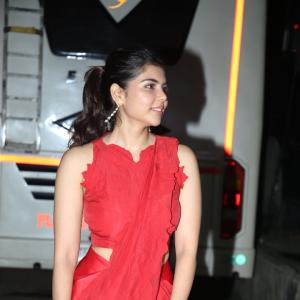 Kalyani Priyadarshan Stuns in Red Saree at Event – Elegant and Graceful Look