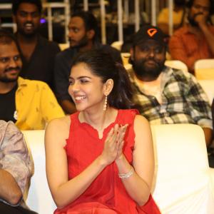 Kalyani Priyadarshan Stuns in Red Saree at Event – Elegant and Graceful Look