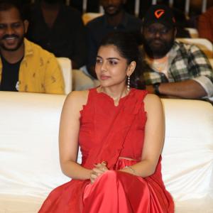 Kalyani Priyadarshan Stuns in Red Saree at Event – Elegant and Graceful Look