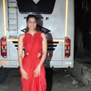 Kalyani Priyadarshan Stuns in Red Saree at Event – Elegant and Graceful Look