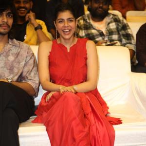 Kalyani Priyadarshan Stuns in Red Saree at Event – Elegant and Graceful Look