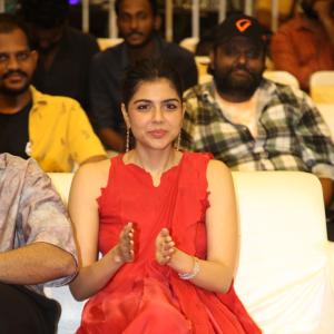 Kalyani Priyadarshan Stuns in Red Saree at Event – Elegant and Graceful Look