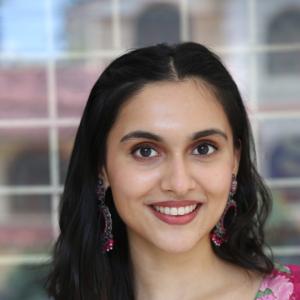 Actress Riya Jithu Radiates Elegance in Pink Floral Ethnic Outfit