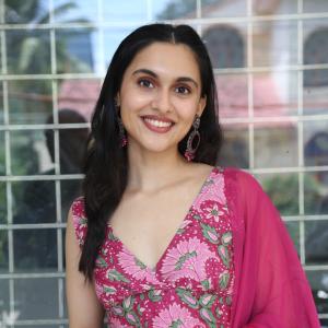 Actress Riya Jithu Radiates Elegance in Pink Floral Ethnic Outfit