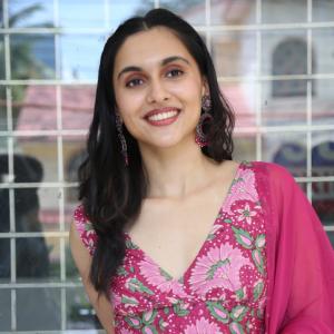 Actress Riya Jithu Radiates Elegance in Pink Floral Ethnic Outfit