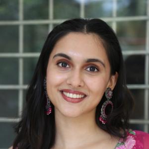 Actress Riya Jithu Radiates Elegance in Pink Floral Ethnic Outfit