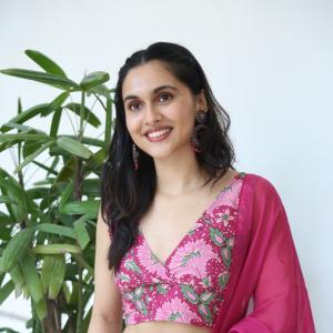 Actress Riya Jithu Radiates Elegance in Pink Floral Ethnic Outfit