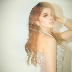 Kriti Shetty Shines in Glamorous Silver Outfit with Pearl Jewelry
