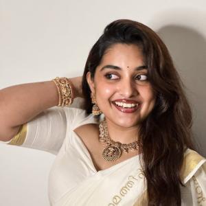 Nivetha Thomas Looks Elegant in Traditional Kerala Kasavu Saree