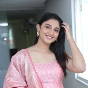Ritika Nayak Looks Elegant in Pink Silk Saree with Golden Accessories