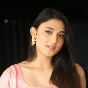 Ritika Nayak Looks Elegant in Pink Silk Saree with Golden Accessories