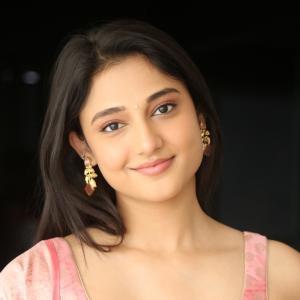 Ritika Nayak Looks Elegant in Pink Silk Saree with Golden Accessories