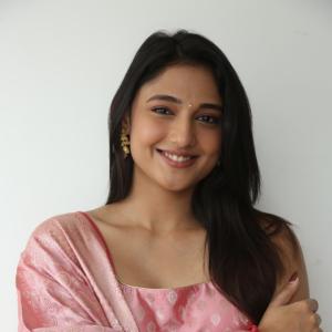 Ritika Nayak Looks Elegant in Pink Silk Saree with Golden Accessories