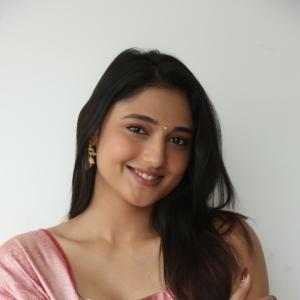 Ritika Nayak Looks Elegant in Pink Silk Saree with Golden Accessories