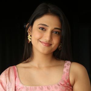 Ritika Nayak Looks Elegant in Pink Silk Saree with Golden Accessories