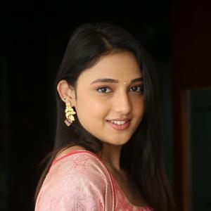 Ritika Nayak Looks Elegant in Pink Silk Saree with Golden Accessories