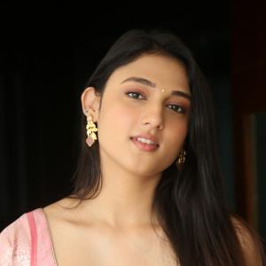 Ritika Nayak Looks Elegant in Pink Silk Saree with Golden Accessories