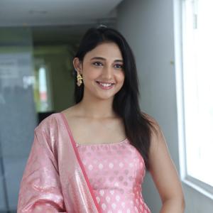 Ritika Nayak Looks Elegant in Pink Silk Saree with Golden Accessories