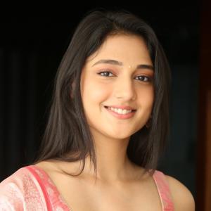 Ritika Nayak Looks Elegant in Pink Silk Saree with Golden Accessories