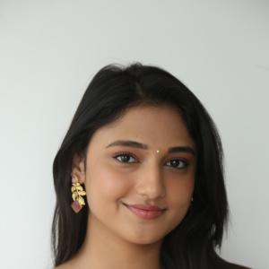 Ritika Nayak Looks Elegant in Pink Silk Saree with Golden Accessories