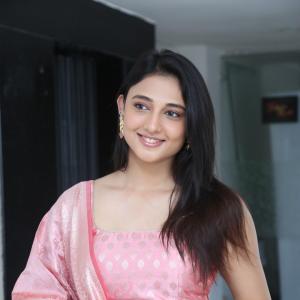 Ritika Nayak Looks Elegant in Pink Silk Saree with Golden Accessories