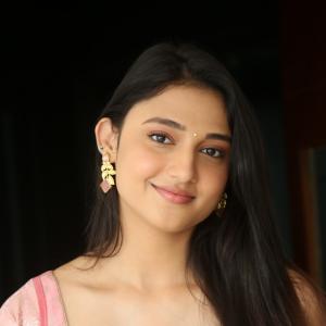 Ritika Nayak Looks Elegant in Pink Silk Saree with Golden Accessories