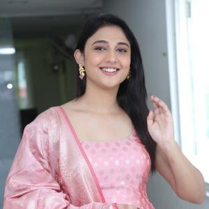 Ritika Nayak Looks Elegant in Pink Silk Saree with Golden Accessories