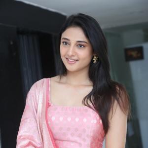 Ritika Nayak Looks Elegant in Pink Silk Saree with Golden Accessories