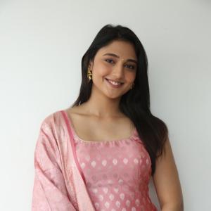 Ritika Nayak Looks Elegant in Pink Silk Saree with Golden Accessories