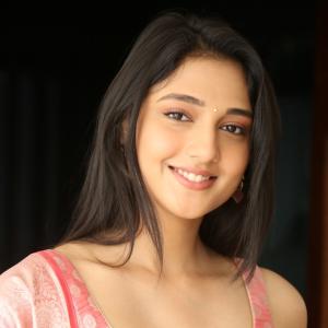 Ritika Nayak Looks Elegant in Pink Silk Saree with Golden Accessories