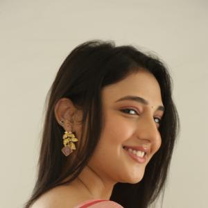 Ritika Nayak Looks Elegant in Pink Silk Saree with Golden Accessories