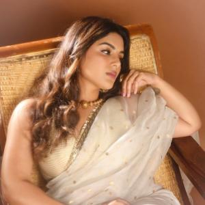 Samyukta Menon Looks Stunning in Ivory Saree with Gold Jewelry